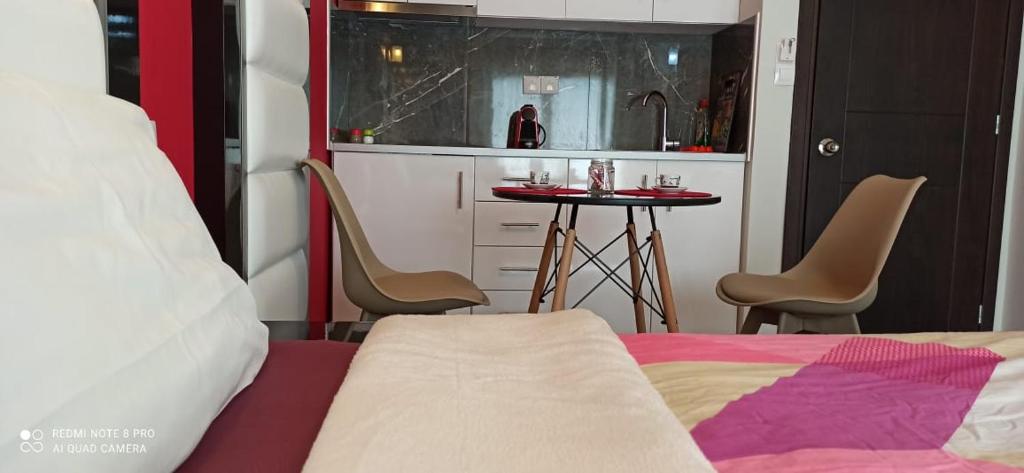 Posezení v ubytování Spiros Rooms