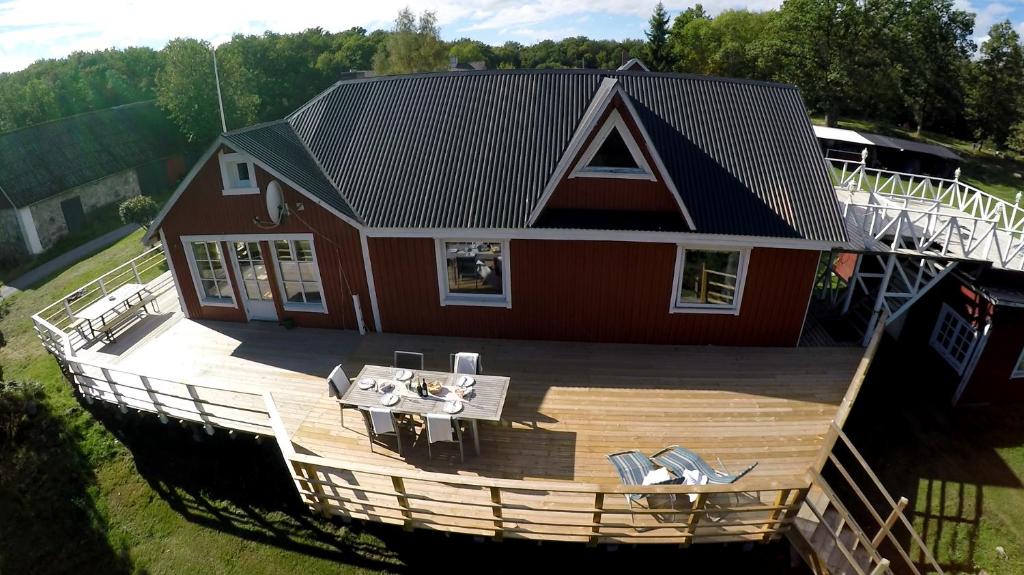 an aerial view of a house with a deck at Landhouse in Olofström