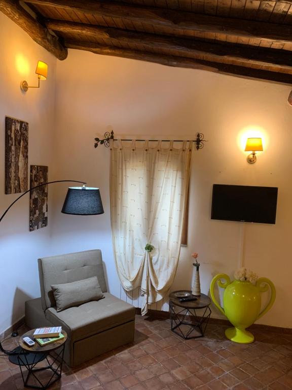 TV a/nebo společenská místnost v ubytování B&B Villa Loriana