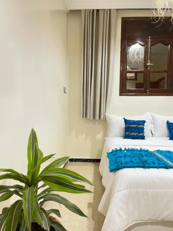 Postel nebo postele na pokoji v ubytování darna surf house anza