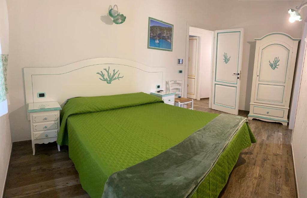 Postel nebo postele na pokoji v ubytování B&B da Miranna