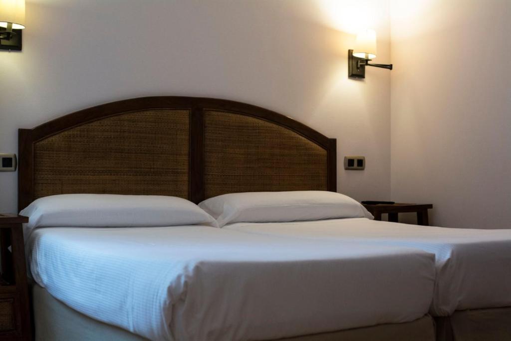 Postel nebo postele na pokoji v ubytování Hotel Rural Casa de Campo