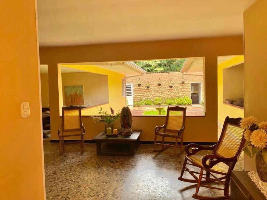 Istumisnurk majutusasutuses Agradable finca campestre familiar con piscina