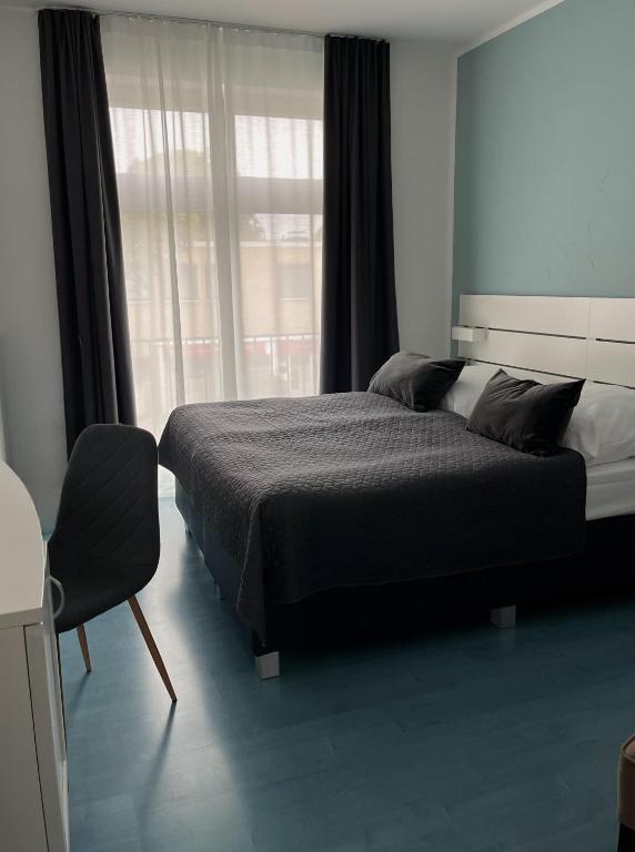 Postel nebo postele na pokoji v ubytování Boutique Hotel VIVA CREATIVO