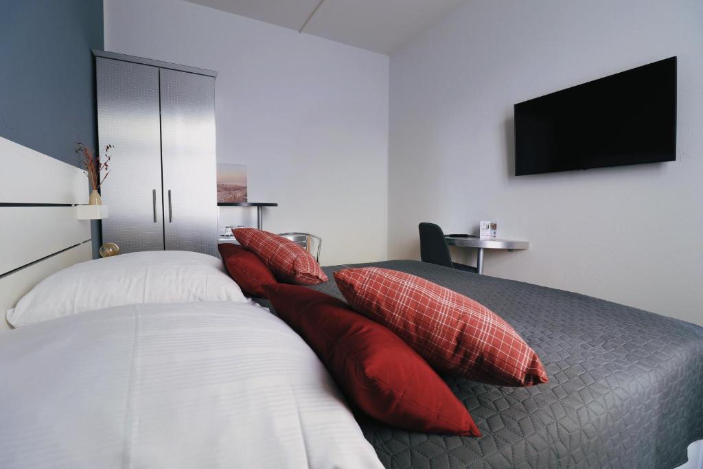 Postel nebo postele na pokoji v ubytování Boutique Hotel VIVA CREATIVO