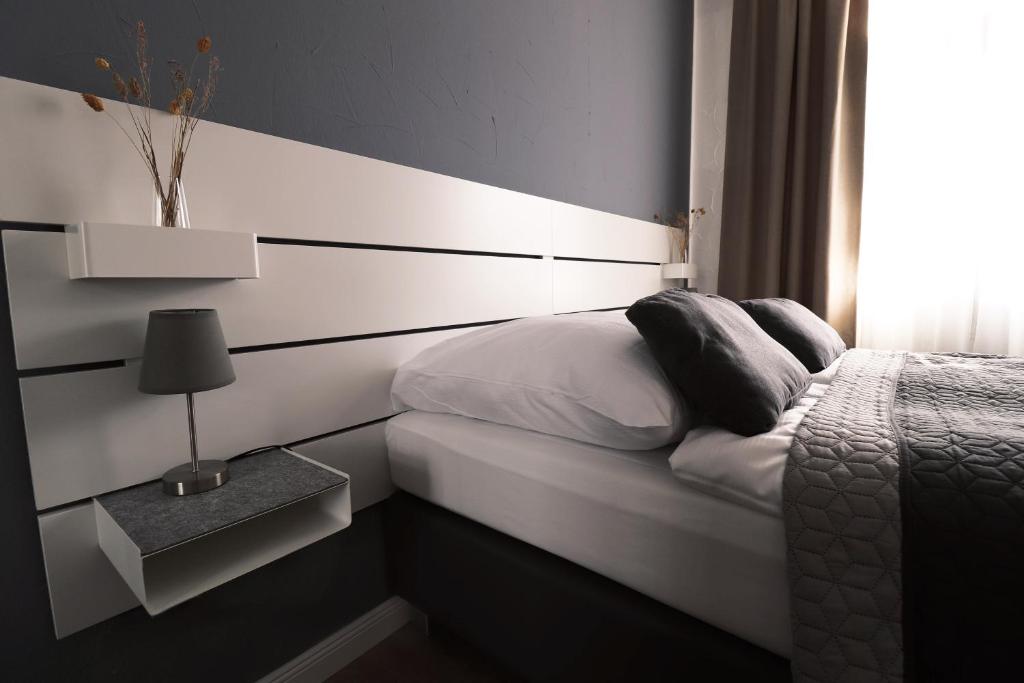 Postel nebo postele na pokoji v ubytování Boutique Hotel VIVA CREATIVO