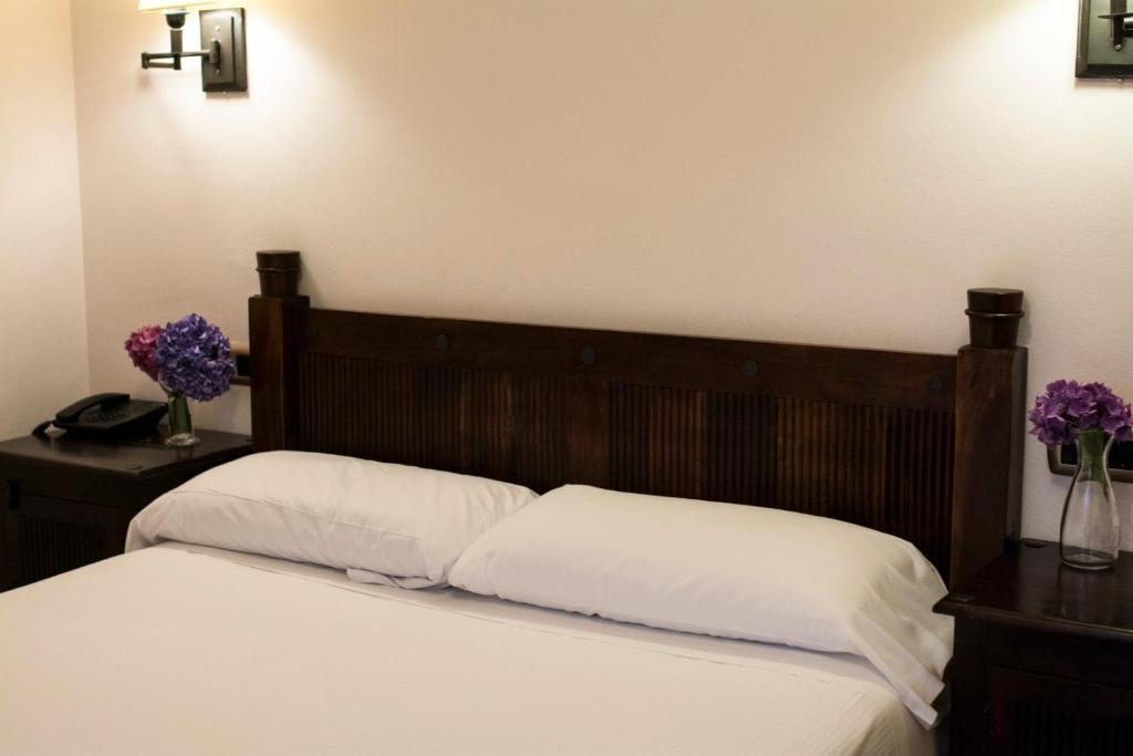 Postel nebo postele na pokoji v ubytování Hotel Rural Casa de Campo