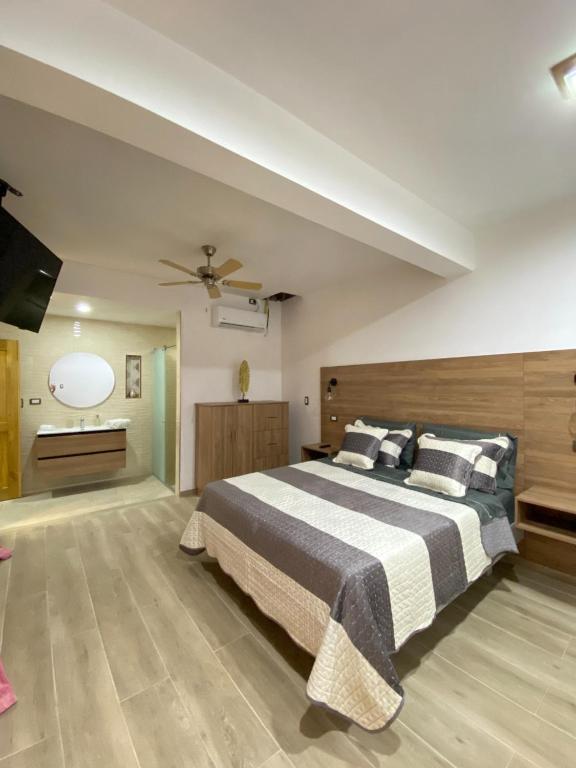 Postel nebo postele na pokoji v ubytování Hotel Paso Realce