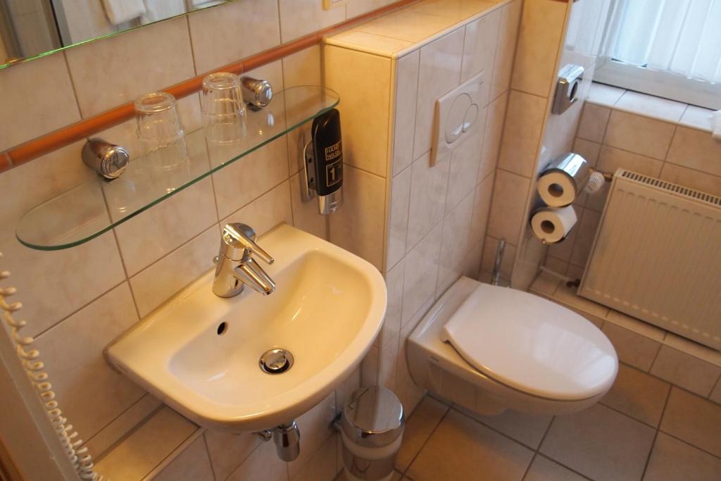 Ein Badezimmer in der Unterkunft Hotel Imperial