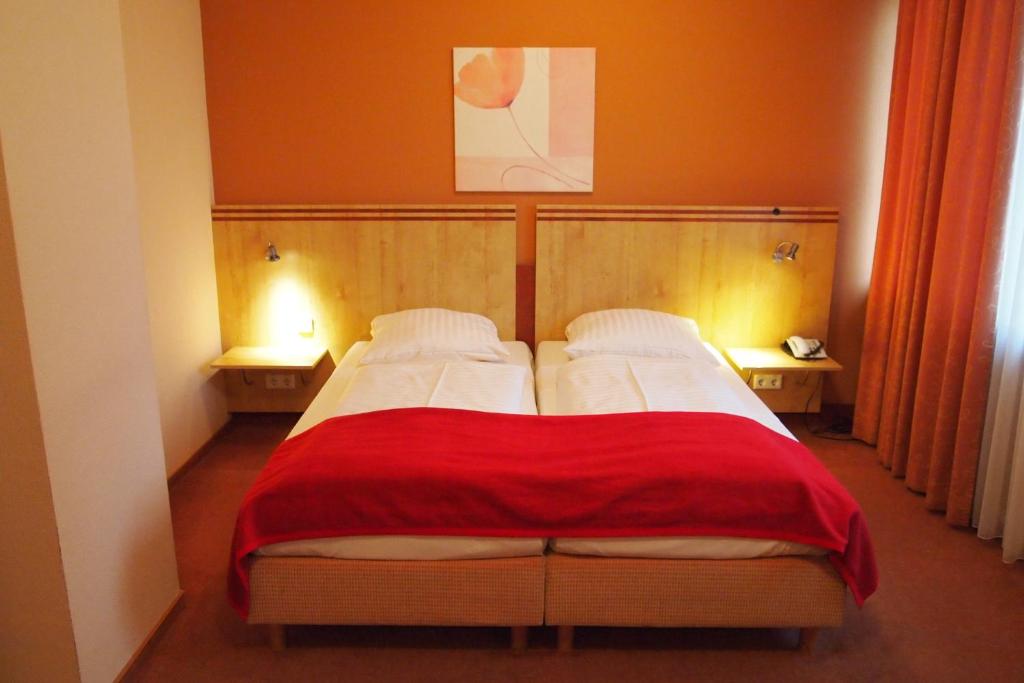 Ein Bett oder Betten in einem Zimmer der Unterkunft Hotel Imperial