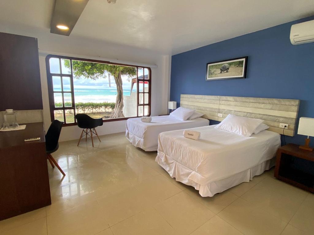 Postel nebo postele na pokoji v ubytování Casita de la Playa