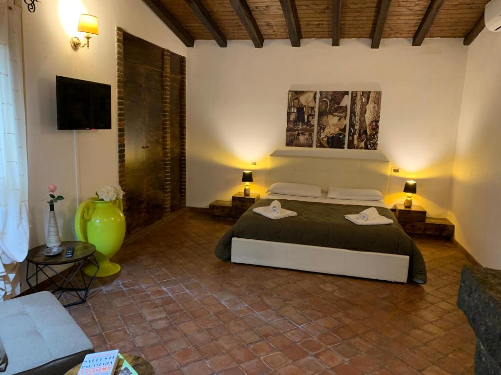 Postel nebo postele na pokoji v ubytování B&B Villa Loriana
