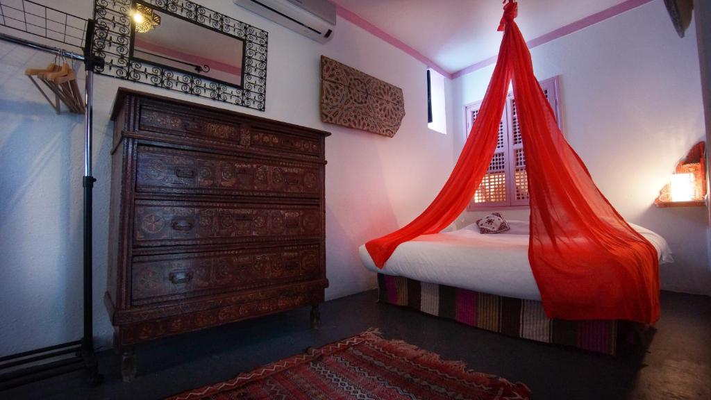 Uma cama ou camas num quarto em Hotel Casa Miguel