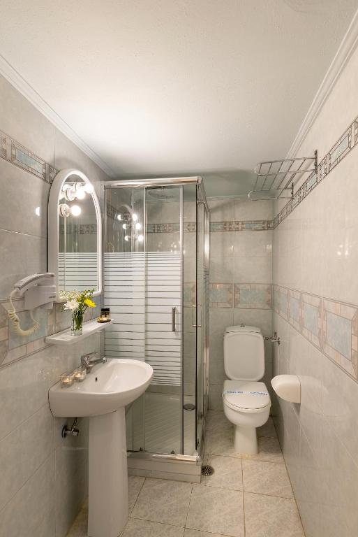 Koupelna v ubytování Hotel Palladion