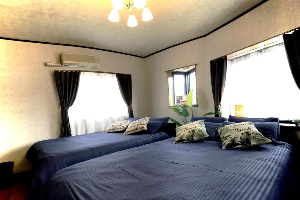 Katil atau katil-katil dalam bilik di IKI HOUSE KATSUMOTOURA - Vacation STAY 13495v