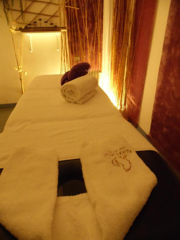 Uma cama ou camas num quarto em Hotel Lusitania Congress & Spa
