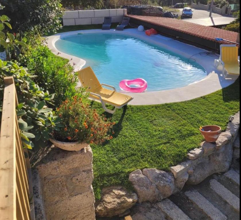 Swimming pool sa o malapit sa Casa do Pinheiro Manso