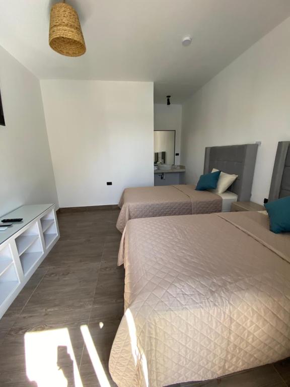 Postel nebo postele na pokoji v ubytování Riviera Vichayito