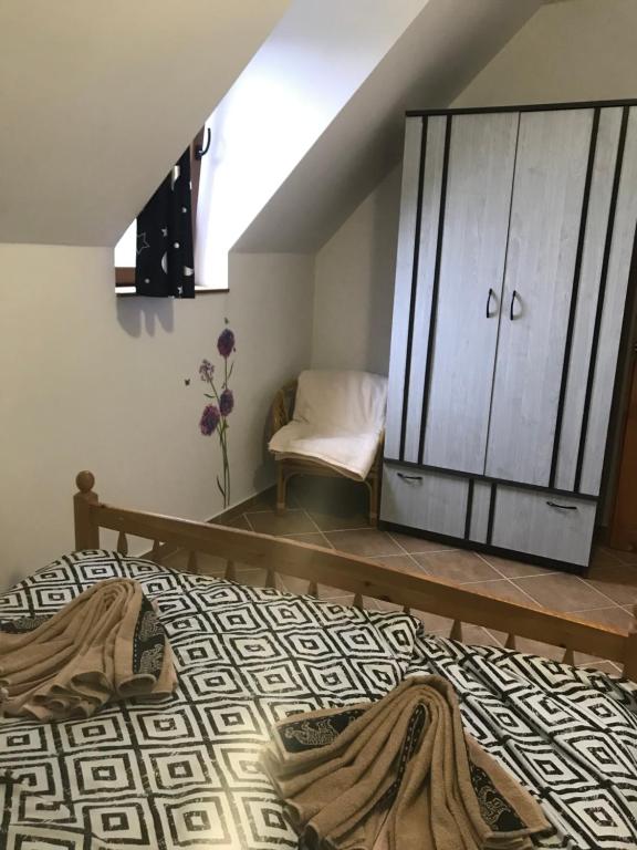Postel nebo postele na pokoji v ubytování Erdey Apartman