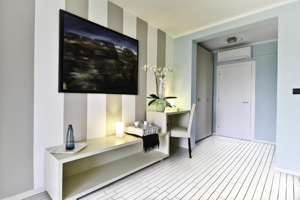 TV a/nebo společenská místnost v ubytování B&B Calligaris