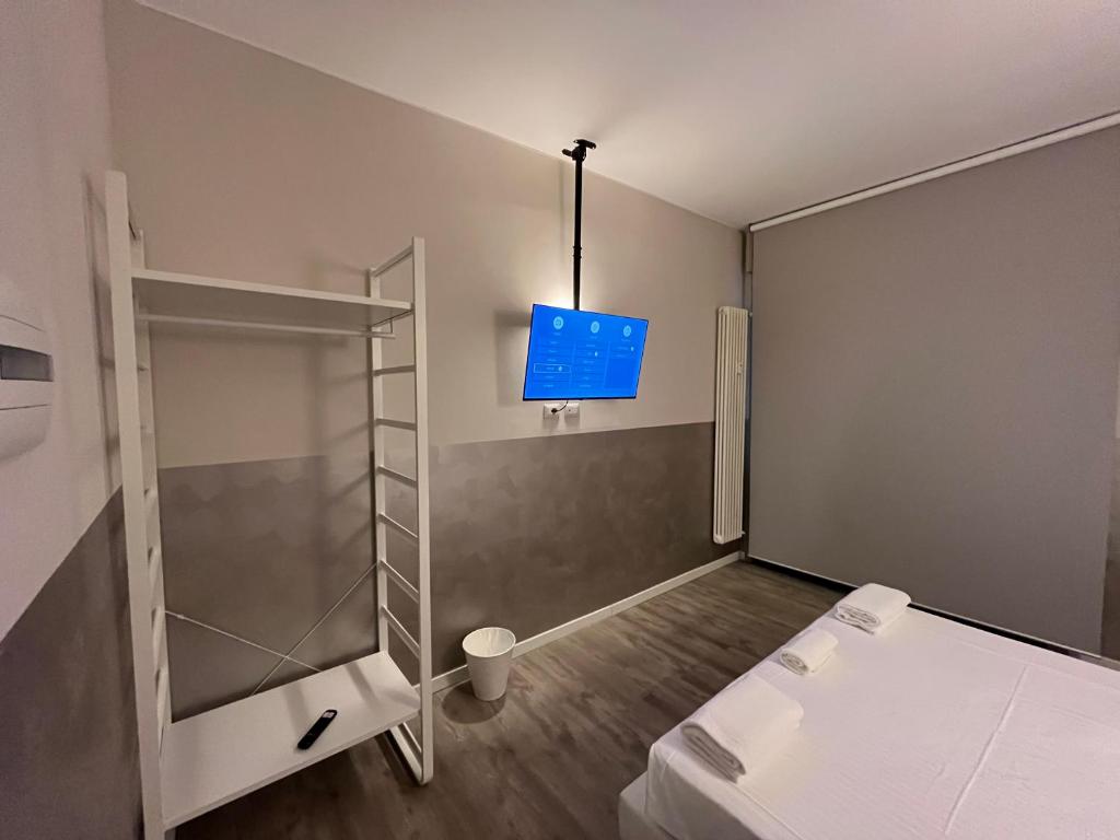 Postel nebo postele na pokoji v ubytování Bergamo Automatic Rooms Self check-in