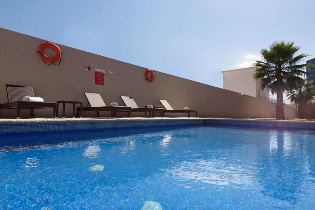 Bazén v ubytování Extended Suites Queretaro Juriquilla nebo v jeho okolí
