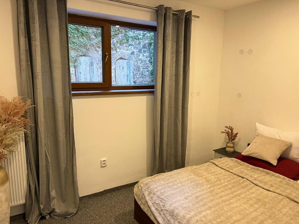 Postel nebo postele na pokoji v ubytování Thermal Apartments
