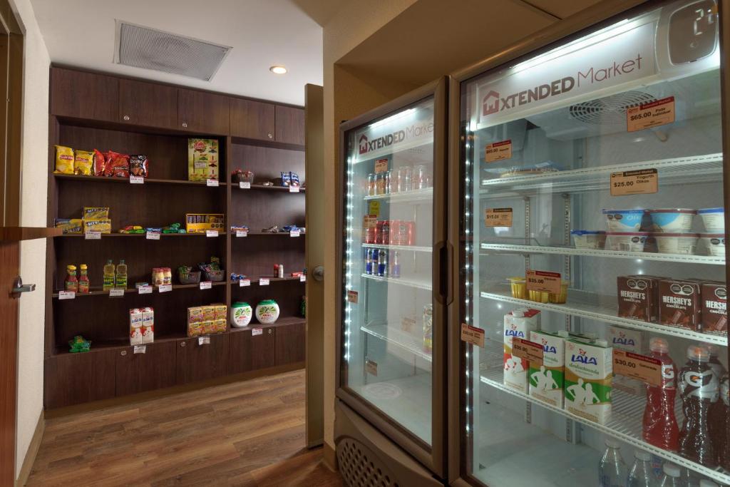 Supermarket nebo jiné obchody v  aparthotelu nebo okolí