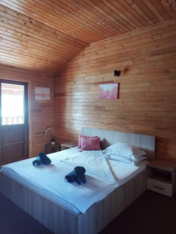 Postel nebo postele na pokoji v ubytování Casa David