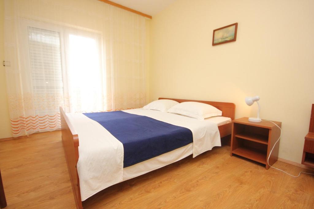 Posteľ alebo postele v izbe v ubytovaní Apartments by the sea Kraj, Pasman - 333