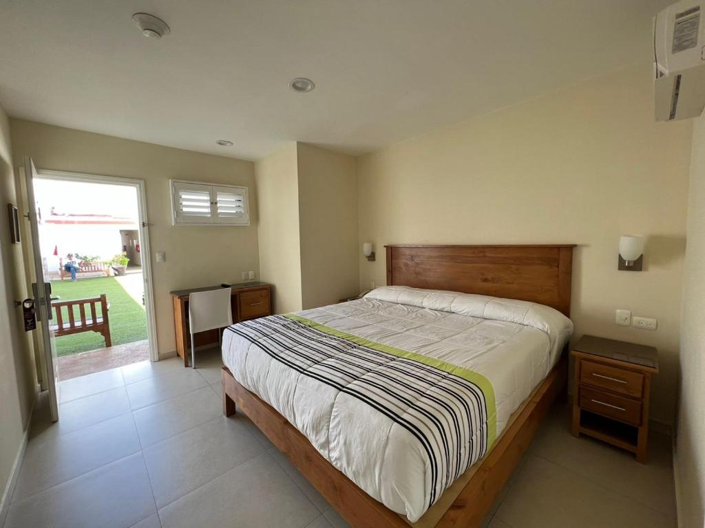 Postel nebo postele na pokoji v ubytování Hotel Baja