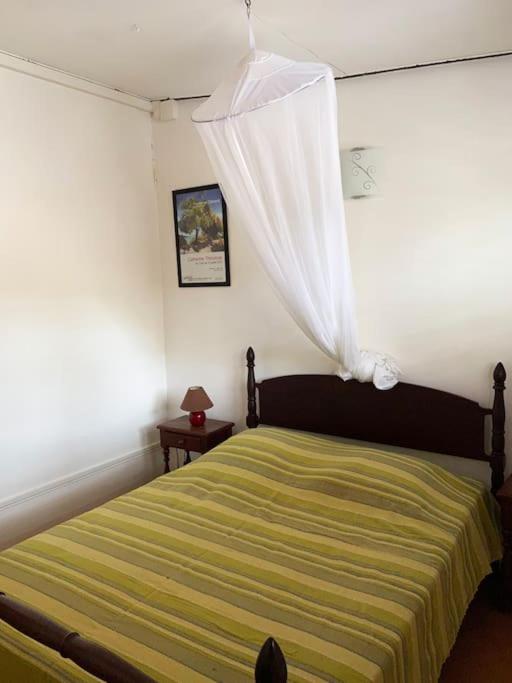 Postel nebo postele na pokoji v ubytování Le Caillou *** Belle villa, 4 chambres, piscine, vue mer ***