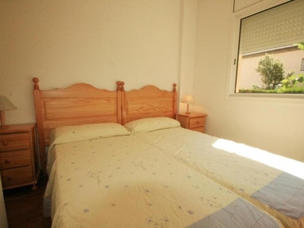 Posteľ alebo postele v izbe v ubytovaní Villa con jardín y piscina privada para 8 personas en Las Tres Calas, cerca de Ametlla de Mar - HISP-217-7