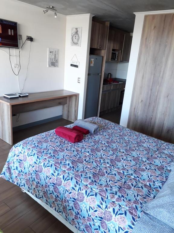 เตียงในห้องที่ Depto. Barcelona Rucakawi 2