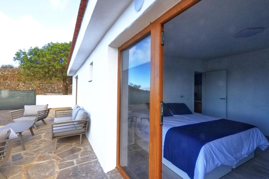 Postel nebo postele na pokoji v ubytování Vivienda vacacional Agripina
