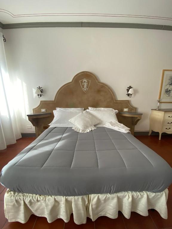 Posteľ alebo postele v izbe v ubytovaní Palazzo Mari suite & rooms b&b