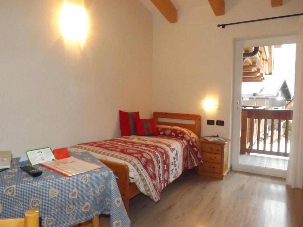 Postel nebo postele na pokoji v ubytování Hotel Vigo