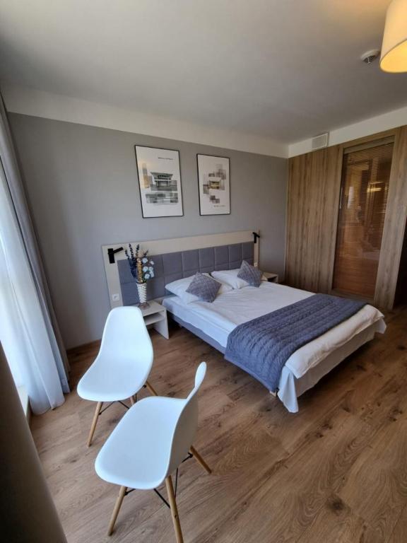 Posteľ alebo postele v izbe v ubytovaní Warsaw Apartments - Luxury Top-view Aparthotel