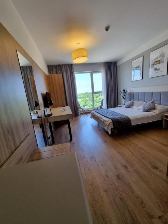 Posteľ alebo postele v izbe v ubytovaní Warsaw Apartments - Luxury Top-view Aparthotel