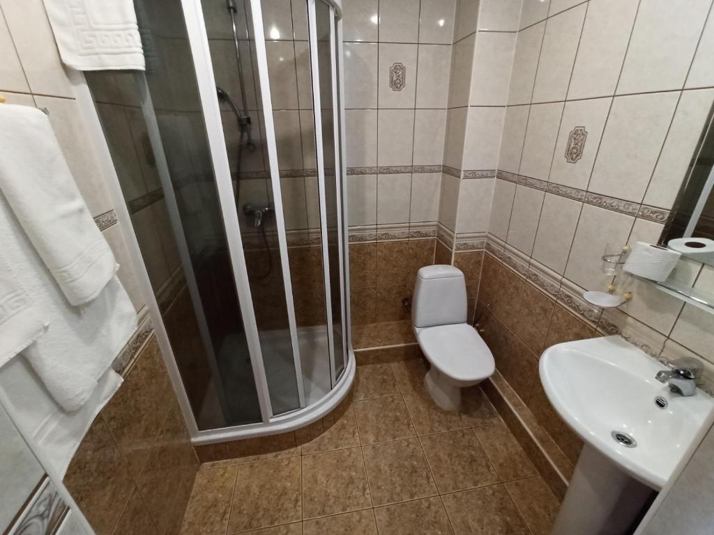 Koupelna v ubytování Hotel Laagna