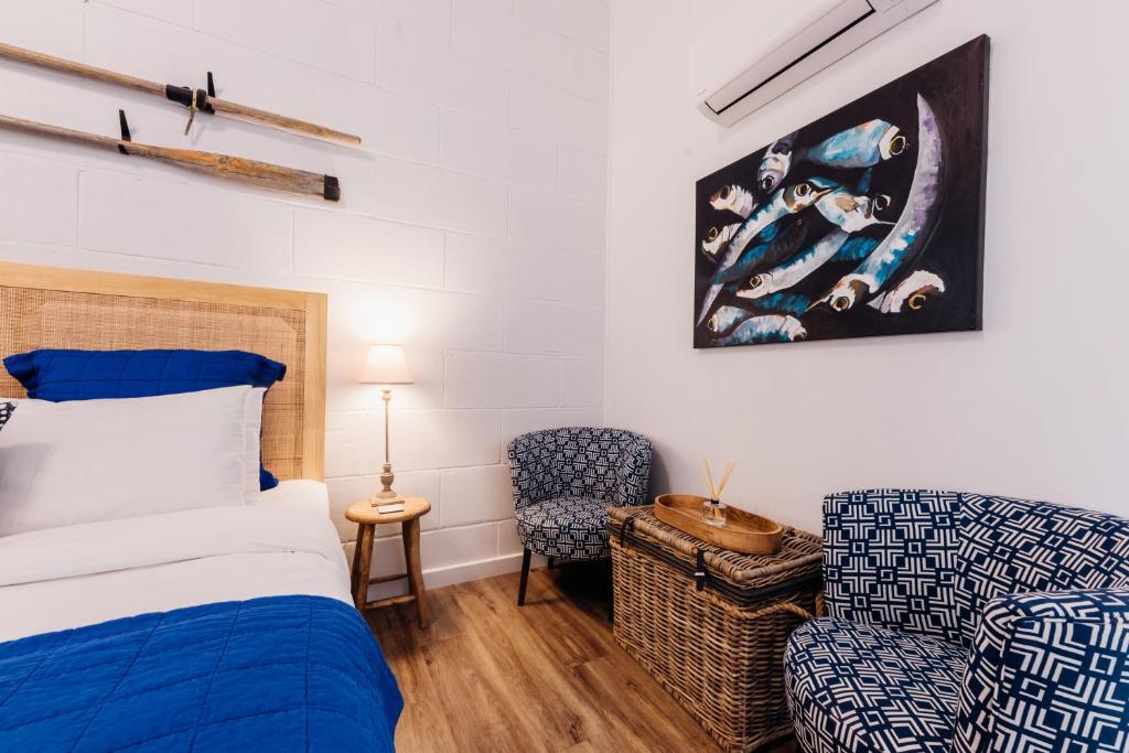 Postel nebo postele na pokoji v ubytování Port O' Call Motel