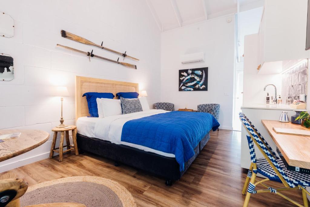 Postel nebo postele na pokoji v ubytování Port O' Call Motel