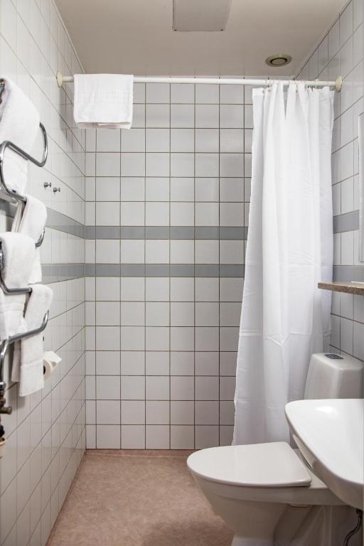 Koupelna v ubytování Hotell Lindgården