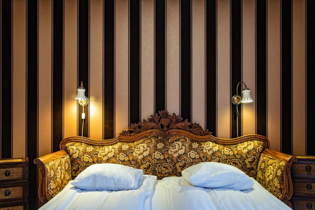 Postel nebo postele na pokoji v ubytování Hotell Lindgården