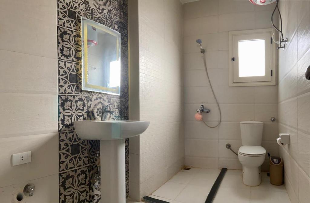 A bathroom at Bahga Palace 4 Residential Apartments