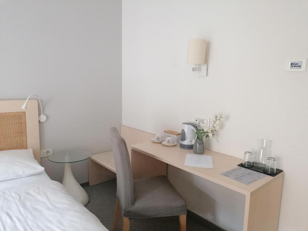 Postel nebo postele na pokoji v ubytování Art Hotel