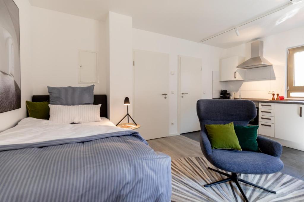 Katil atau katil-katil dalam bilik di Appartement Champagne