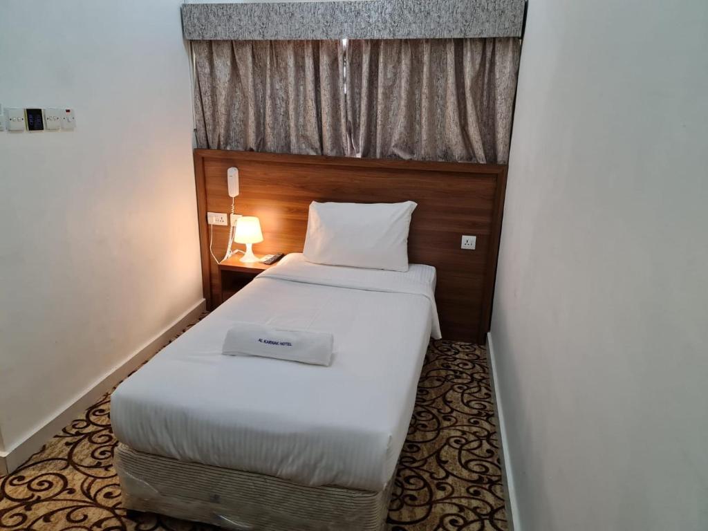 Postel nebo postele na pokoji v ubytování AL KARNAK HOTEL - BRANCH
