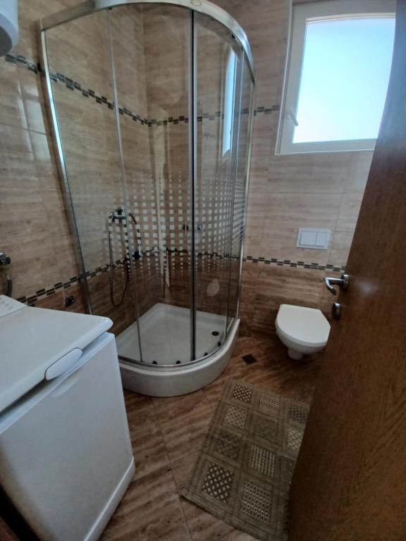 Kúpeľňa v ubytovaní Apartmani Sunčev sjaj