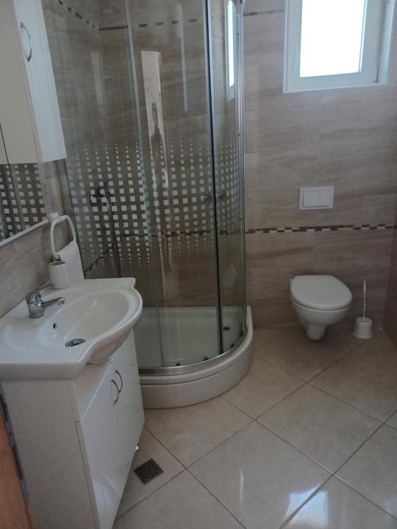 Kúpeľňa v ubytovaní Apartmani Sunčev sjaj